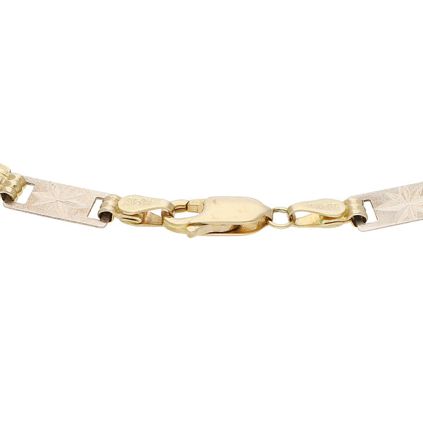 Pulsera eslabón articulado en oro tres tonos 14 kilates.