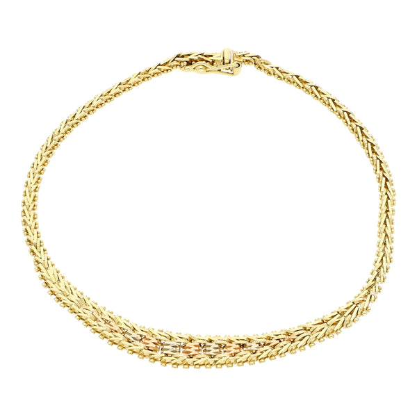 Pulsera eslabón boleado en oro tres tonos 14 kilates.