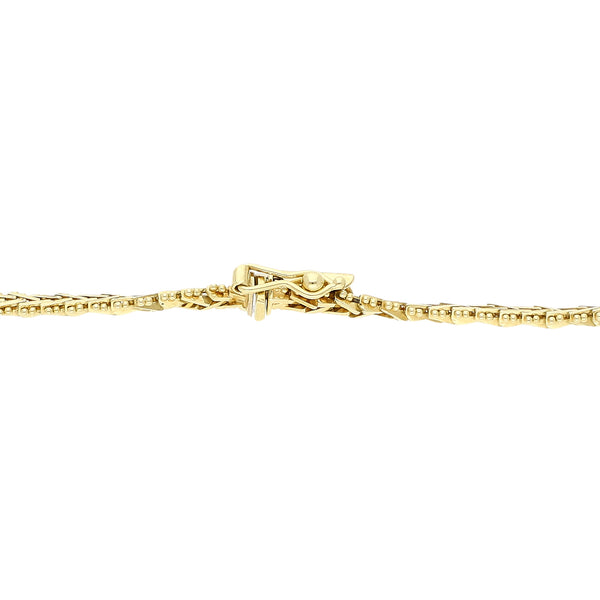Pulsera eslabón boleado en oro tres tonos 14 kilates.