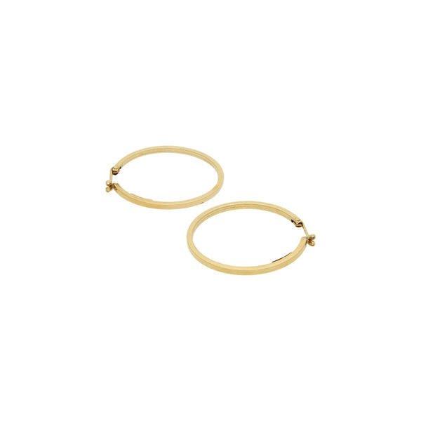 Arracadas lisas en oro amarillo 14 kilates.