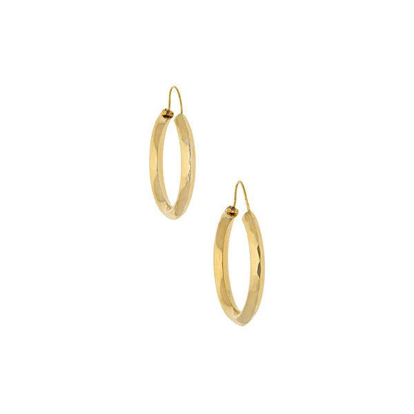 Arracadas facetadas en oro amarillo 18 kilates.
