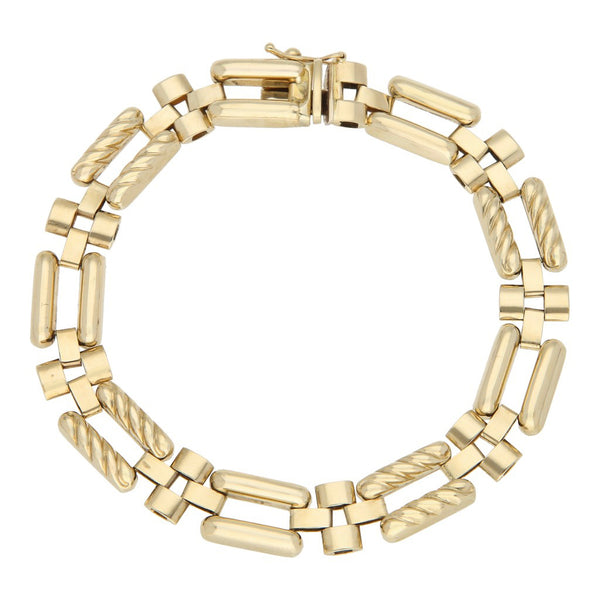 Pulsera eslabón articulado en oro amarillo 14 kilates.