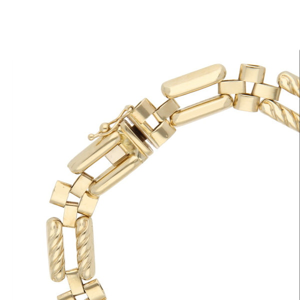 Pulsera eslabón articulado en oro amarillo 14 kilates.