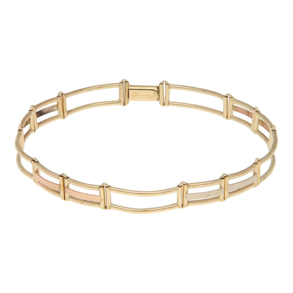 Pulsera eslabón articulado en oro tres tonos 14 kilates.