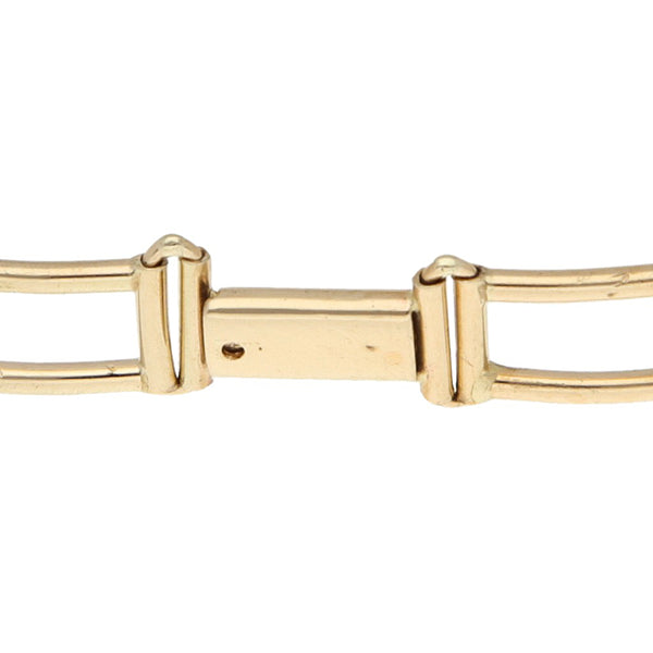 Pulsera eslabón articulado en oro tres tonos 14 kilates.