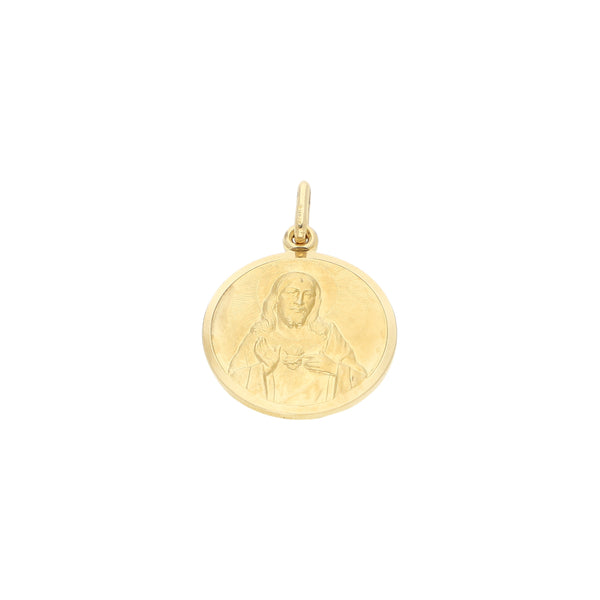Medalla imagen doble en oro amarillo 18 kilates.