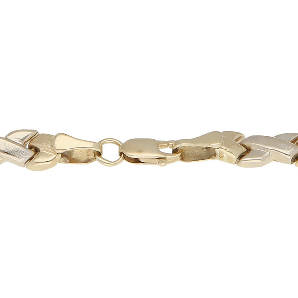 Pulsera eslabón articulado en oro amarillo 14 kilates.