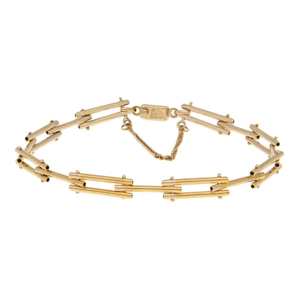 Pulsera eslabón articulado en oro amarillo 14 kilates.