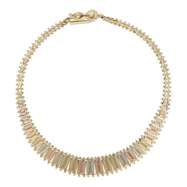 Pulsera eslabón boleado en oro tres tonos 14 kilates.