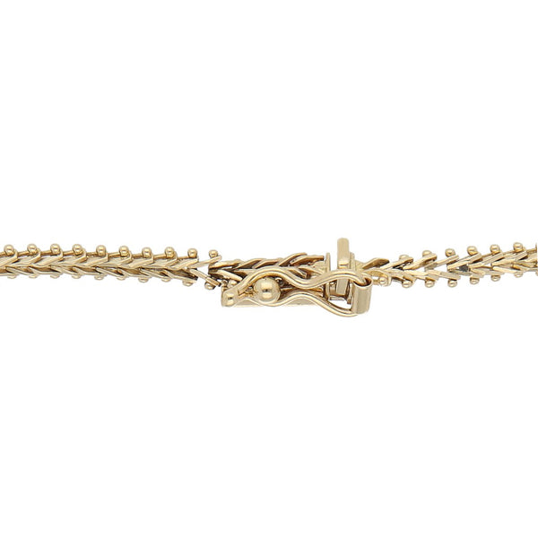Pulsera eslabón boleado en oro tres tonos 14 kilates.