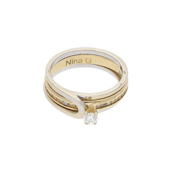 Anillo de compromiso dos piezas con diamantes en oro dos tonos 14 kilates.