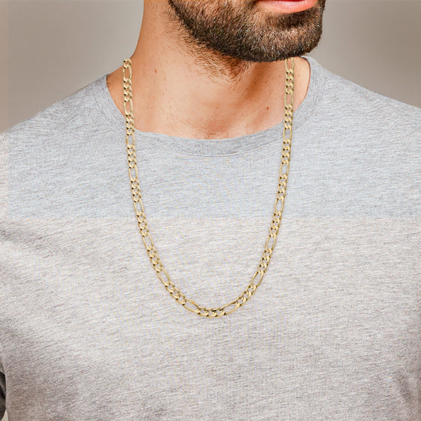 Collar de tres eslabones por uno en oro amarillo 14 kilates.