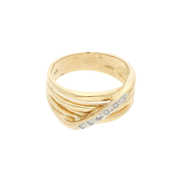 Anillo estilizado con diamantes en oro amarillo 14 kilates.