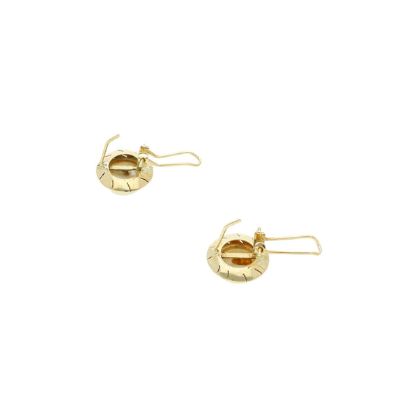 Juego de anillo y aretes estriados con perlas en oro amarillo 14 kilates.