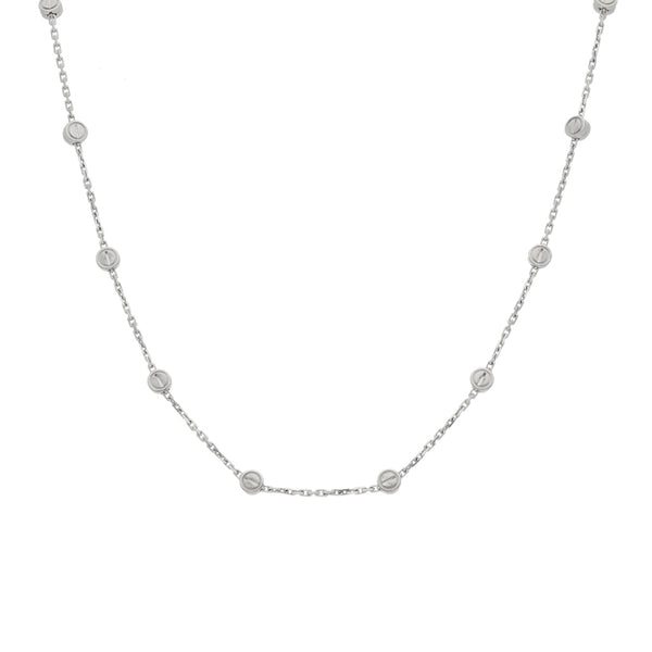 Gargantilla eslabón cruzado firma Cartier con aplicaciones motivo tornillos en oro blanco 18 kilates.