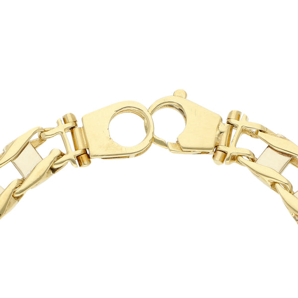 Pulsera eslabón articulado con ónix en oro dos tonos 14 kilates.