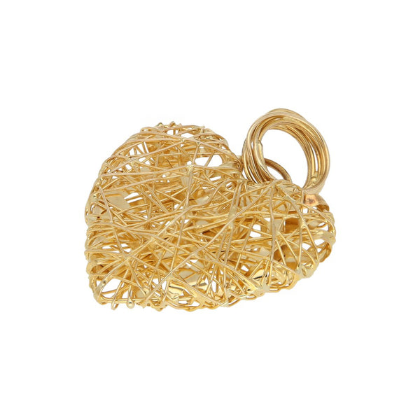 Dije diseño especial motivo corazón en oro amarillo 14 kilates.