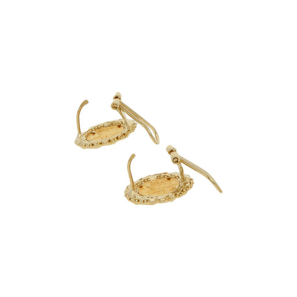 Juego de aretes y anillo boleados con aplicaciones motivo moneda en oro amarillo 14 kilates.
