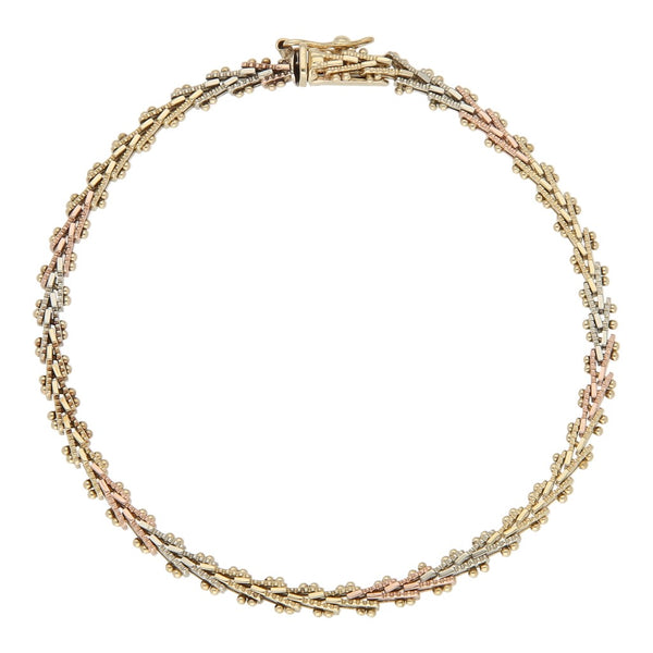 Pulsera eslabón boleado en oro tres tonos 14 kilates.