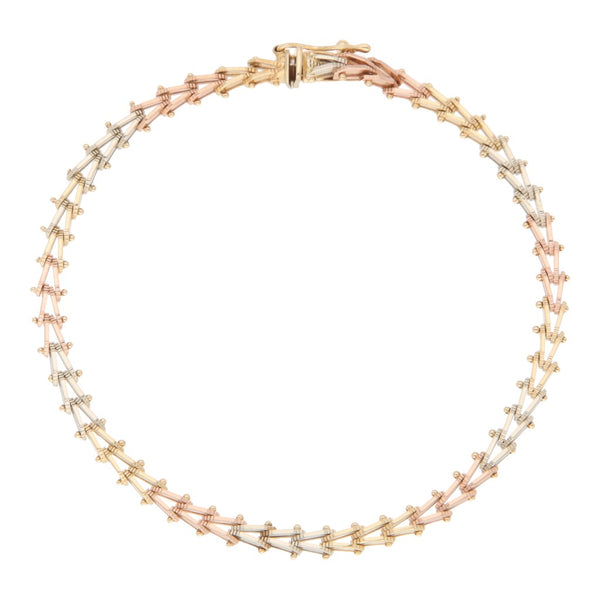 Pulsera eslabón boleado en oro tres tonos 14 kilates.