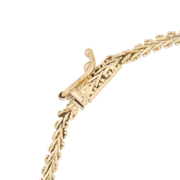 Pulsera eslabón boleado en oro amarillo 14 kilates.