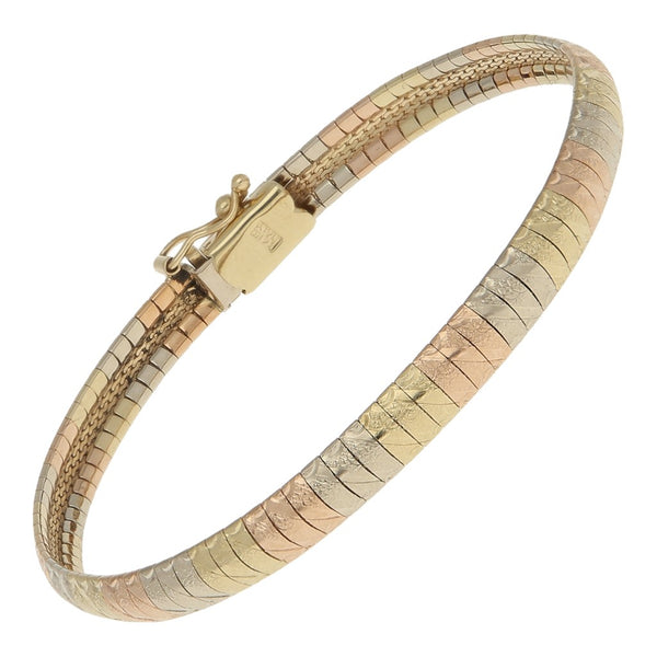 Pulsera eslabón laminado en oro tres tonos 14 kilates.