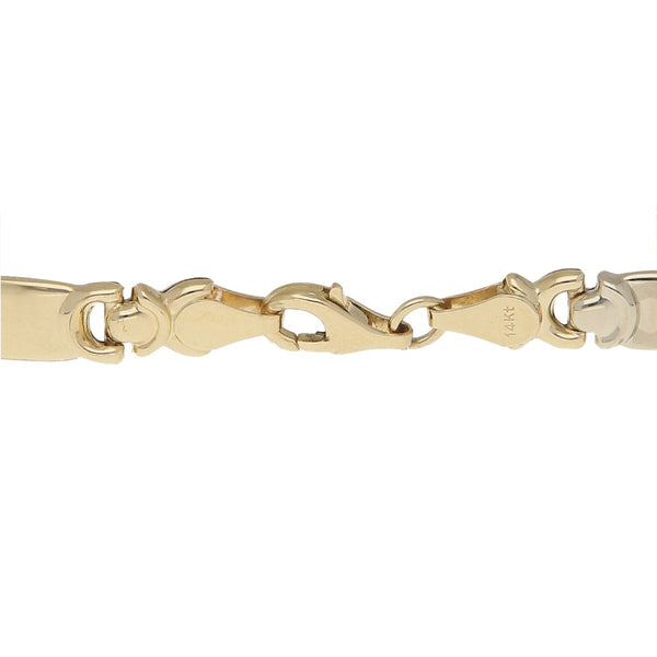 Pulsera eslabón articulado en oro tres tonos 14 kilates.