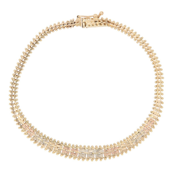Pulsera eslabón boleado en oro tres tonos 14 kilates.