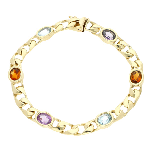 Pulsera eslabón encontrado con aplicaciones y sintéticos en oro amarillo 14 kilates.