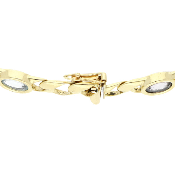 Pulsera eslabón encontrado con aplicaciones y sintéticos en oro amarillo 14 kilates.