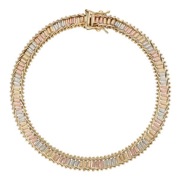 Pulsera eslabón boleado en oro tres tonos 14 kilates.