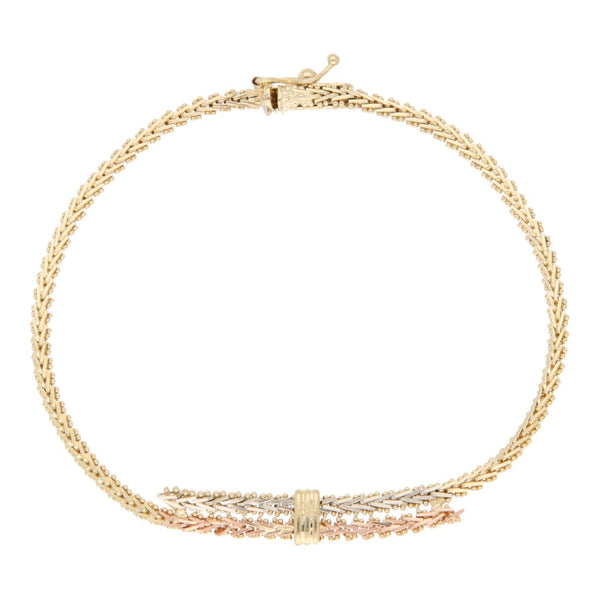 Pulsera eslabón boleado en oro tres tonos 14 kilates.