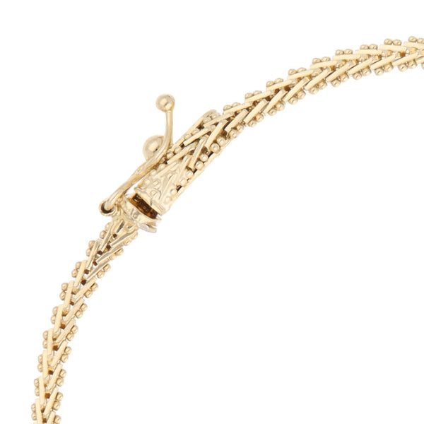 Pulsera eslabón boleado en oro tres tonos 14 kilates.