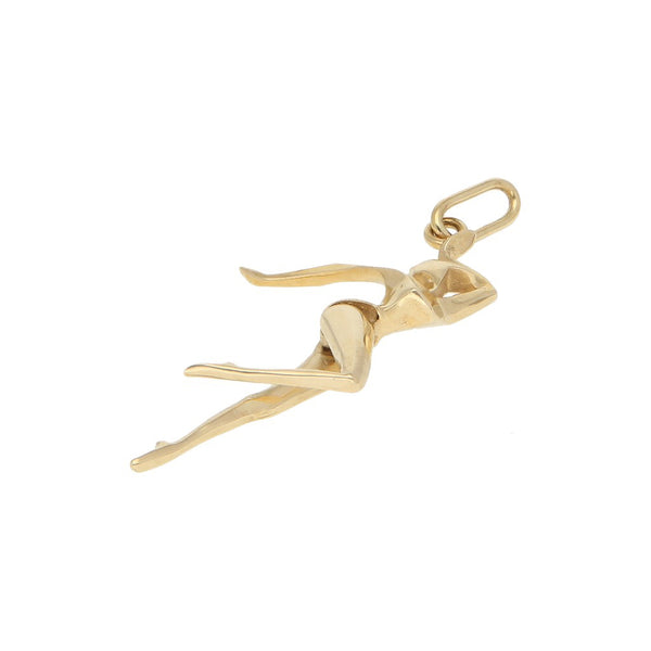 Dije articulado motivo bailarina en oro amarillo 14 kilates.