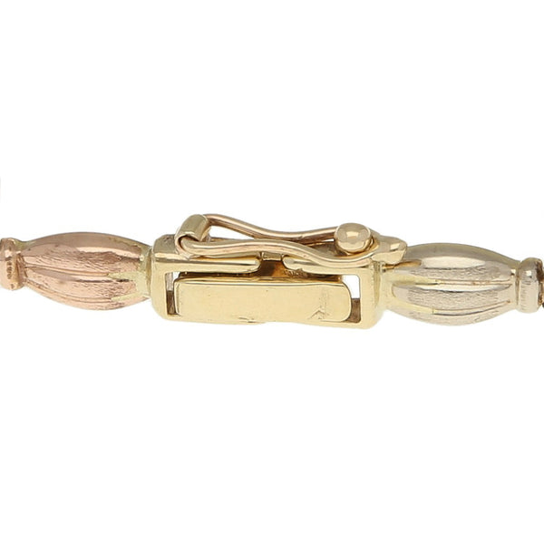 Pulsera eslabón articulado en oro amarillo 14 kilates.