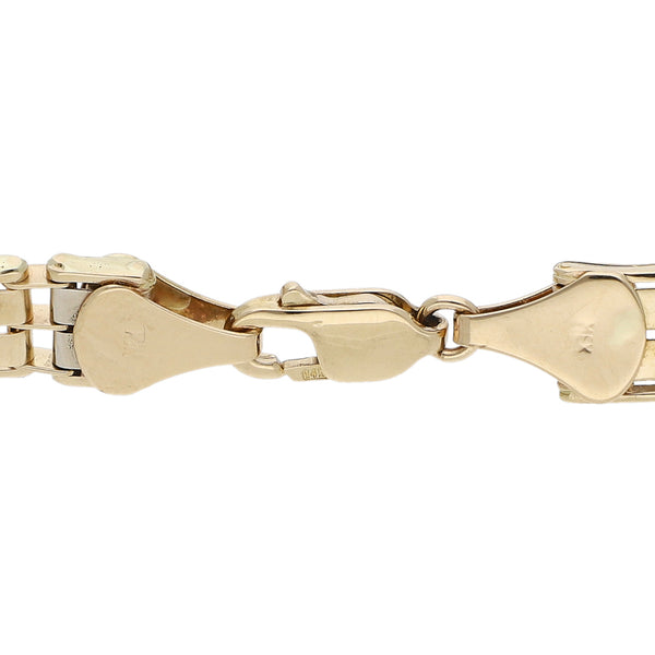 Pulsera eslabón articulado en oro dos tonos 14 kilates.
