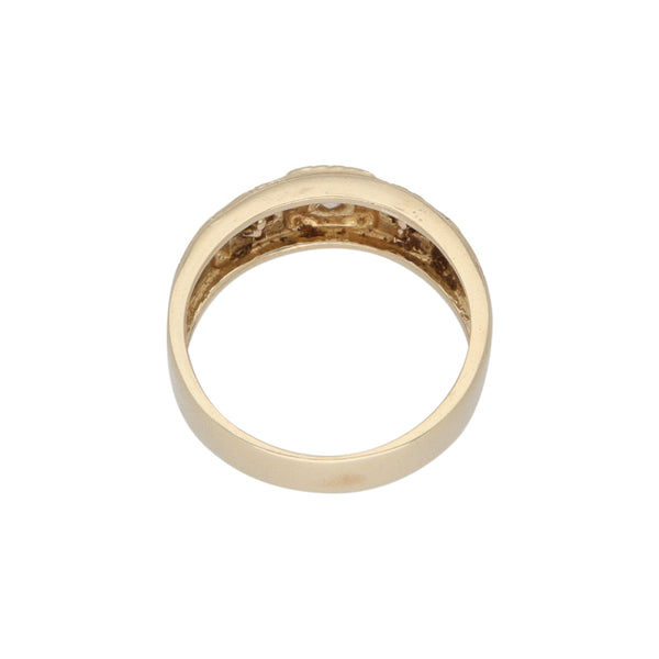 Anillo diseño especial con sintetico en oro dos tonos 14 kilates.