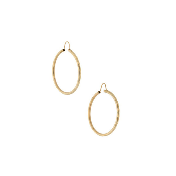 Arracadas facetadas en oro amarillo 14 kilates.
