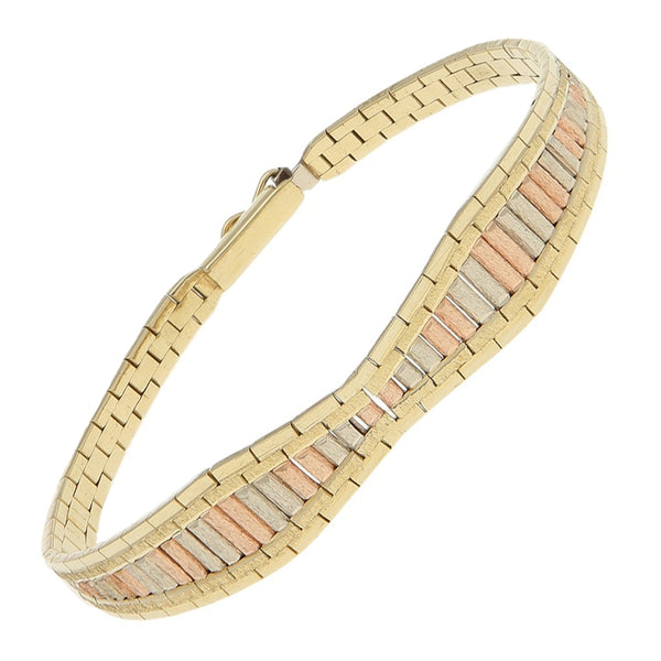 Pulsera eslabón laminado en oro tres tonos 14 kilates.