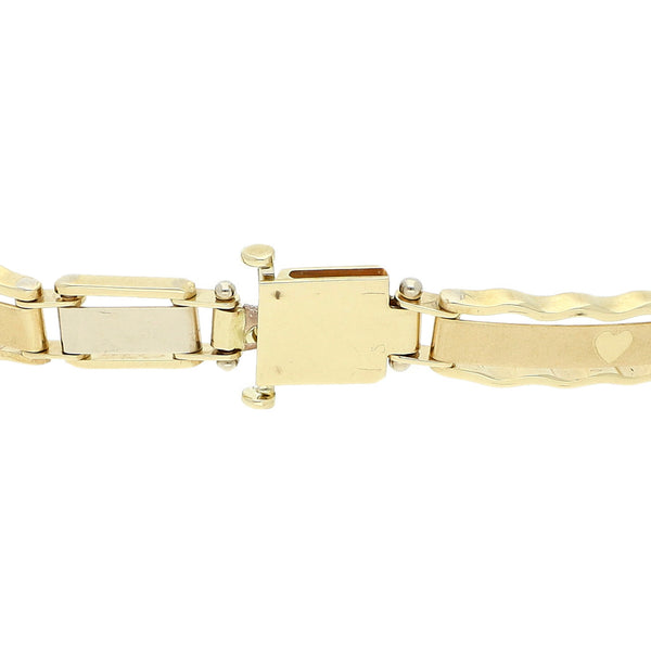 Pulsera eslabón articulado en oro dos tonos 14 kilates.
