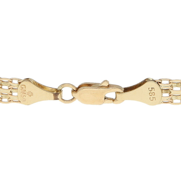 Pulsera eslabón combinado en oro amarillo 14 kilates.