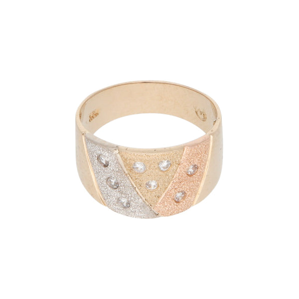 Anillo diseño especial con circonias en oro tres tonos 18 kilates.