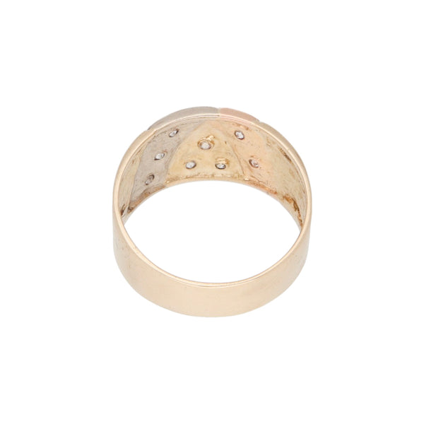 Anillo diseño especial con circonias en oro tres tonos 18 kilates.
