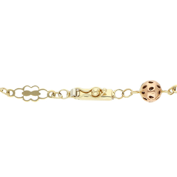 Pulsera eslabón calado en oro tres tonos 14 kilates.