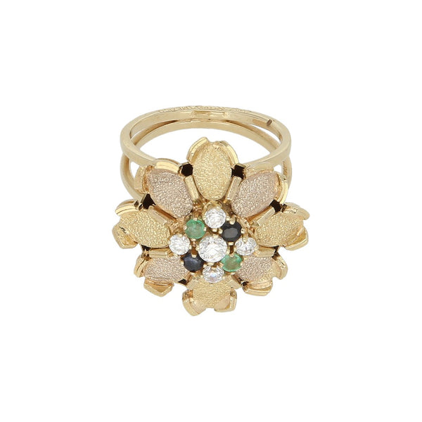 Anillo diseño especial con sintéticos en oro dos tonos 14 kilates.
