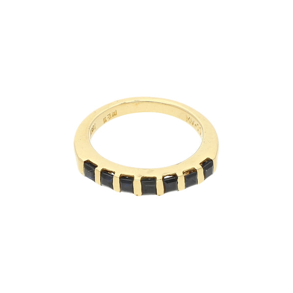 Anillo diseño especial con zafiros en oro amarillo 18 kilates.