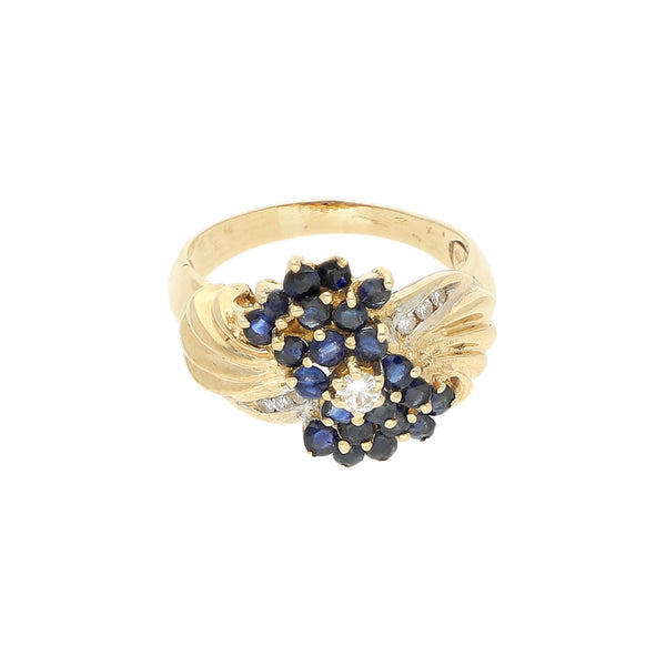 Anillo diseño especial con diamantes y zafiros en oro amarillo 14 kilates.