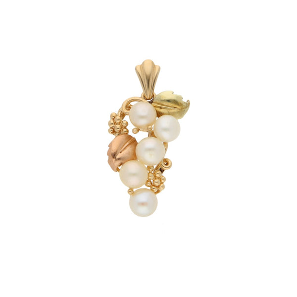 Dije diseño especial con perlas en oro dos tonos 14 kilates.