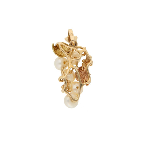 Dije diseño especial con perlas en oro dos tonos 14 kilates.