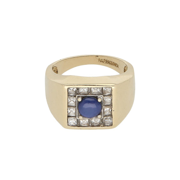 Anillo tipo sello con zafiro estrella y sintéticos en oro amarillo 14 kilates.